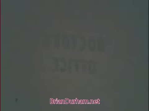 The still features the text 'DOCTOR' prominently displayed, suggesting a focus on medical professionals. It is likely part of a recruiting commercial aimed at attracting doctors to the Air Force Reserve during the Vietnam era. The image appears to be slightly blurred or faded, reflecting the vintage quality of 16mm film.