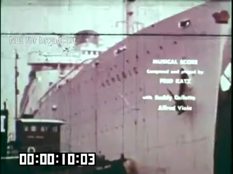 The still features a large ship, likely a passenger liner, which suggests a theme of immigration. Text overlays indicate the musical composition by Fred Eatz and credits for artists Buddy Collette and Albert Viscio. The image is likely from the early 20th century, reflecting the immigrant experience, particularly related to Irish heritage, as indicated by its connection to the Irish Rovers. The film appears to focus on cultural and historical narratives surrounding immigration.