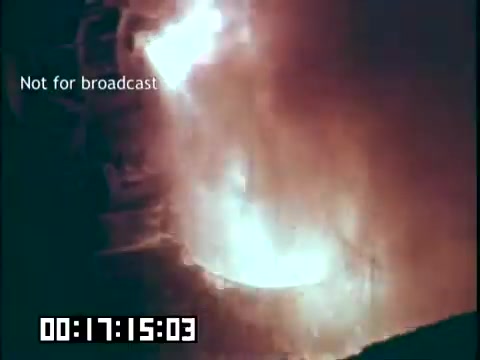 The still from 'Immigrant Heritage' shows a scene featuring flames or fire, likely related to a cultural or historical representation relevant to the film's themes. The text 'Not for broadcast' indicates it's a restricted visual, and the timecode suggests it's part of a longer segment. The fiery imagery may symbolize passion, struggle, or transformation, tying into the immigrant experience central to the film.