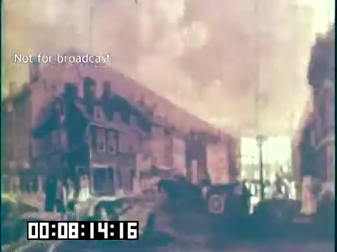 The 16mm still from 'Immigrant Heritage' features a historical street scene, likely depicting an Irish setting. The image has a nostalgic, faded quality, suggesting an earlier era, with buildings lining the street and figures possibly engaging in daily activities. The text 'Not for broadcast' indicates that this is a private or unlicensed clip. The overall atmosphere reflects themes of heritage and community, relevant to the film's focus on immigrant experiences.