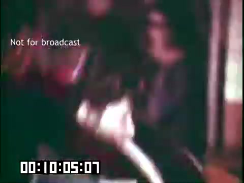 The still from 'Immigrant Heritage' features a group in a lively setting, likely a performance or gathering, showcasing cultural elements associated with Irish heritage. The image captures movement and camaraderie, reflecting the celebration of immigrant traditions, possibly with musicians or dancers from the Irish Rovers. The text 'Not for broadcast' suggests it is an excerpt meant for archival or educational purposes rather than public airing.