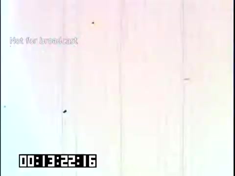 The still shows a portion of the film 'Immigrant Heritage' featuring the Irish Rovers. It appears to be a 16mm film frame with a light background, possibly indicating a scene transition or a less defined visual quality typical of older films. The timestamp is visible at the bottom, and there is a message stating 'Not for broadcast.' The overall composition suggests a segment of an educational piece focusing on immigrant heritage, emphasizing the cultural contributions of the Irish.