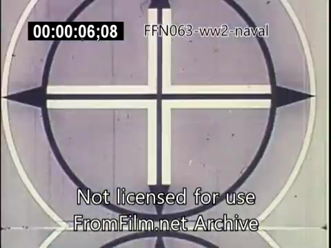 The 16mm still features a circular target design with a central cross, likely used for naval training or targeting during World War II. The context suggests it relates to kamikaze attacks, highlighting the strategic challenges faced by US naval forces in that era. The footage is part of an archival collection focused on wartime events.