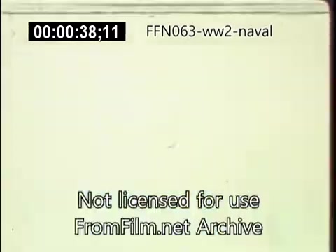 The still from 'US Naval footage - World War 2 - kamikaze attacks' depicts a moment likely capturing an aerial attack. The frame features a light background, possibly indicating sky or water. There's visible text overlay indicating the footage is not licensed for use. The overall context relates to the intense naval battles during World War II, specifically focusing on kamikaze tactics used by Japanese forces.