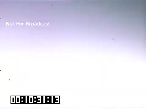 The still appears to be a scene from a 16mm footage of a Detroit Tigers game at Briggs Stadium, likely captured between 1948 and 1950. The image shows a high-contrast, washed-out scene without discernible action or figures, possibly indicating the end of a reel or an unfinished scene. The accompanying timecode suggests a timestamp within the footage. The background is light, and some small artifacts are visible, typical of older film stocks. The 'Not For Broadcast' label indicates this was not intended for public viewing.