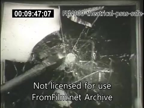 The still features a close-up shot of a shattered glass panel, likely representing the aftermath of a car accident. The image serves as a dramatic visual reminder of the dangers associated with unsafe driving practices. It's part of a 1949 public service announcement campaign aimed at promoting safe driving behaviors. The stark imagery underscores the serious consequences of reckless driving.