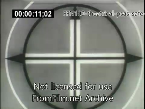 The still features a black-and-white visual of a circular target-like design, prominently displaying a cross in the center. It serves as an introductory graphic for a 1949 theatrical public service announcement focused on safe driving. The design is simple and geometric, indicative of mid-20th-century graphic style, aimed at capturing viewer attention for an important message. The timestamp and watermark indicate its archival nature.