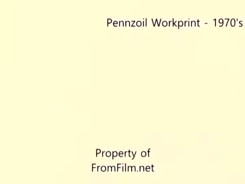 The still presents a title card for 'Pennzoil Workprint - 1970's,' likely part of a 16mm film showcasing the Pennzoil refinery. The background is a simple light yellow, enhancing the text clarity. The lower section notes 'Property of FromFilm.net,' indicating ownership. The context suggests that this is a preliminary version of the film, which may contain visible debris in the film gate during projection. Accompanied by atmospheric music from Underbelly, the overall feel is nostalgic and industrial.