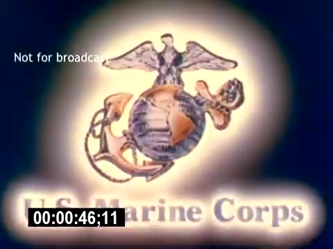 The still features the U.S. Marine Corps emblem, prominently displaying the globe, anchor, and eagle. The design is illuminated against a gradient backdrop, emphasizing its significance. The text 'U.S. Marine Corps' is displayed beneath the emblem, highlighting the recruiting theme of the film. A time code at the bottom indicates the duration of the segment. The image is marked 'Not for broadcast,' denoting its use for internal or educational purposes.