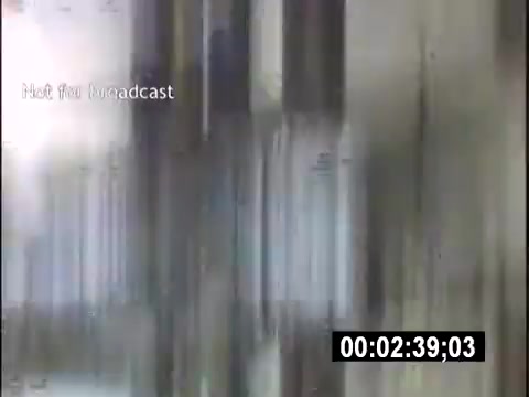 The still from 'College Days - 1956 home movie' appears to be a distorted or blurred image, possibly from an old 16mm film. The text “Not for broadcast” suggests that it is meant for personal use rather than public airing. The timestamp indicates it is 2 minutes and 39 seconds into the footage, though specific content details are not clear due to the visual quality.