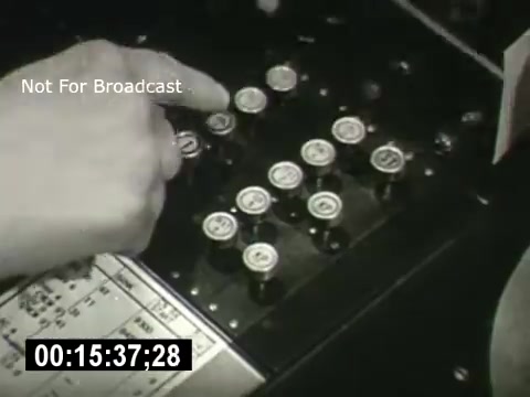 The still depicts a close-up of a hand pressing buttons on a control panel, likely from the Bell System film 'Story Without End.' The panel features multiple round buttons, some lit, and includes a timestamp at the bottom. The overall mood is technical, indicating interaction with telecommunications equipment. The label 'Not For Broadcast' suggests it is not intended for public viewing.