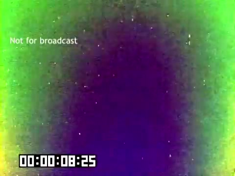 The 16mm still displays a vibrant, color-shifting background, primarily featuring hues of green and purple. Overlaying the image is a 'Not for broadcast' watermark, indicating its intended use is limited. A digital timer at the bottom indicates a time stamp of 8 seconds and 25 frames. The absence of sound from the original sales film adds an air of mystery to the visual, which likely features appearances by Dick Van Dyke and Michael Landon, among others, in a promotional context from 1977.