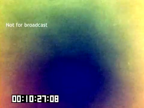 The still from the 16mm Kodak sales film from 1977 features a blurred, colorful background with a prominent text overlay that reads 'Not for broadcast.' A timestamp at the bottom indicates a duration of 10 minutes and 27 seconds. The overall aesthetic appears vintage, likely depicting a promotional or instructional theme aligned with Kodak's marketing efforts during that era.