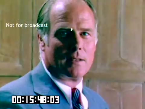 The still features a well-groomed man in a suit, presenting in a professional manner. The background appears to be a wooden paneling, adding a classic touch to the scene. A timestamp at the bottom indicates the time code, and a label reads 'Not for broadcast,' suggesting it's a promotional or internal film. The overall tone is polished and corporate, typical of a sales film from the 1970s.