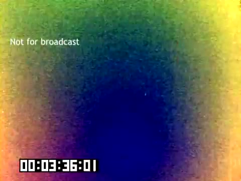 The still appears to feature visual distortion or color gradients, with a dominant blue and green hue. The text 'Not for broadcast' is displayed prominently, indicating the film's restricted use. A time code in the bottom left corner indicates the reel's duration. Overall, the image lacks recognizable subjects or clear information due to its abstract quality.