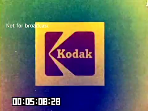 The still features the iconic Kodak logo prominently displayed against a colorful, slightly faded background. The text 'Not for broadcast' is visible in the upper left corner. A timecode in the bottom left corner indicates the elapsed duration of the film, which shows 5 minutes and 8 seconds. The overall aesthetic has a vintage look consistent with late 1970s media.