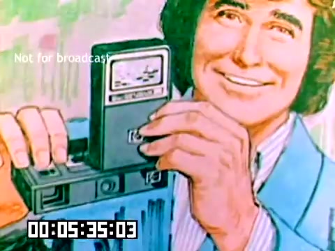 The still features a man with a cheerful expression, holding a vintage Kodak camera. He appears to be promoting the camera, showcasing its features. The image has a colorful, illustrative style, reminiscent of the 1970s advertising aesthetics. A timer at the bottom indicates the elapsed time in the film, and a label advises 'Not for broadcast.' The overall tone is upbeat and promotional, typical for sales films of the era.