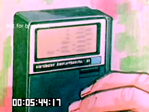 The still shows a close-up of a retro device resembling a calculator or a digital display unit, with a hand hovering over the controls. The background features a colorful, abstract pattern, likely indicative of the 1970s aesthetic. A timer in the corner suggests that this is a captured moment from a film, possibly related to a demonstration or sales presentation for Kodak. The image conveys a vintage feel typical of the era, blending technology and marketing.