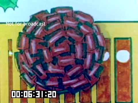 The still shows a colorful animated scene, likely part of a promotional piece by Kodak from 1977. The image features a circular, layered shape resembling a woven basket or rosette, composed of reddish-brown elements arranged in a spiral pattern. The background includes a yellow stripe and circular shapes, suggesting a playful, stylized design aimed at drawing viewers' attention. The timestamp indicates a specific moment in this silent sales film.