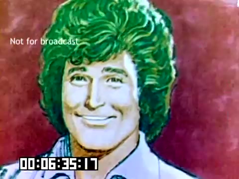 The still is a vibrant illustration of a man with a large, curly hairstyle and a bright smile, likely representing a celebrity from the 1970s. The background has a warm, colorful gradient, enhancing the cheerful tone of the image. The text 'Not for broadcast' is overlayed, and a timestamp appears at the bottom, indicating the film's progress. This image is likely part of an advertisement or promotional material related to Kodak.