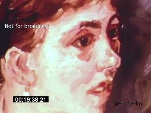 The still from *Vincent Van Gogh: A Self-Portrait (1961)* features an expressive, painterly close-up of a young man's face, capturing the intensity and emotion characteristic of Van Gogh's own work. Rendered in vibrant colors and bold brush strokes, it reflects both the artistic style of Van Gogh and the dramatic storytelling associated with the film, narrated by Lee J. Cobb. This moment emphasizes the interplay of art and identity.