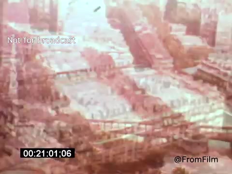 'Vincent Van Gogh: A Self-Portrait' (1961) features a still that showcases an abstract, dreamlike interpretation of Van Gogh's world. The image appears muted with a reddish tint, presenting a cityscape or landscape that hints at the artist's emotional and tumultuous nature. The use of color and overlay suggests a reflective or introspective mood, aligning with the essence of Van Gogh’s artistic style and struggles. Lee J. Cobb’s narration likely deepens this exploration of Van Gogh’s life and artistry.