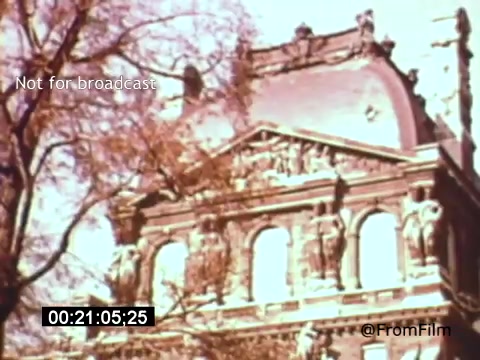 The still from 'Vincent Van Gogh: A Self-Portrait' (1961) features a detailed view of ornate architecture, indicative of the historical context of the film. The colors appear warm and somewhat faded, typical of 16mm film, evoking a nostalgic atmosphere. The scene may serve to complement the narrative surrounding Van Gogh's life and artistry, capturing a moment that reflects his connection to the world around him.   Support the channel: https://ko-fi.com/fromfilm.