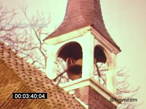 The still from 'Vincent Van Gogh: A Self-Portrait' (1961) features a close-up view of a church bell tower. The bell is prominently displayed within the tower structure, surrounded by a hatched roof and visible trees in the background. The scene captures a serene moment, hinting at Van Gogh's connection to nature and the landscapes surrounding him. The muted colors contribute to a nostalgic and reflective atmosphere. Lee J. Cobb's narration may enhance the visual storytelling.   Support the channel at [Ko-fi](https://ko-fi.com/fromfilm).
