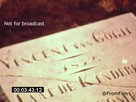 The still from 'Vincent Van Gogh: A Self-Portrait' (1961) features a close-up of a gravestone with the name 'Vincent van Gogh' engraved on it, along with the year '1882.' The image captures the artist's resting place, evoking a somber reflection on his life and legacy. The footage is timestamped, indicating its position within the film.