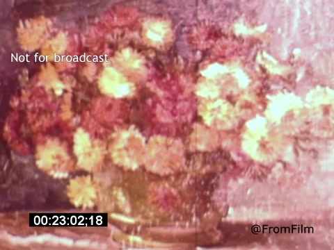 The 16mm still from 'Vincent Van Gogh: A Self-Portrait' (1961) likely depicts a close-up of Van Gogh's famous flower paintings, showcasing vibrant colors in a bouquet. The rich textures and brushwork characteristic of his style are evident. The presence of Lee J. Cobb suggests a narration or commentary, adding depth to the visual representation of Van Gogh's artistry. The image is marked 'Not for broadcast,' indicating it is intended for specific viewing contexts.