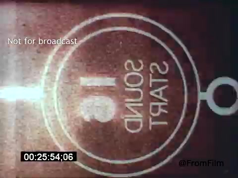 The still from 'Vincent Van Gogh: A Self-Portrait' (1961) features a close-up of a film countdown with the label 'SOUND' and the number '1,' indicating the start of a sound sequence. The background appears textured, hinting at the film's vintage quality. This moment signifies the transition into the narrative featuring Lee J. Cobb, who provides voiceover for Van Gogh's introspective journey.