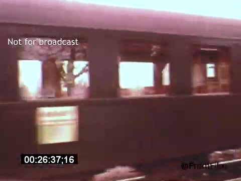 The 16mm still from 'Vincent Van Gogh: A Self-Portrait' (1961) depicts a moving train, likely conveying an impression of travel or transition, which can metaphorically relate to Van Gogh's tumultuous life and artistic journey. The scene captures the passing scenery, with light filtering through the windows, evoking a sense of fleeting moments. Lee J. Cobb's involvement suggests a dramatic narration that might tie the visual elements to Van Gogh's experiences and struggles.