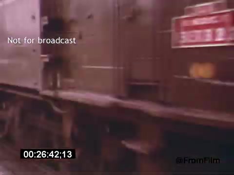 The still from 'Vincent Van Gogh: A Self-Portrait' (1961) features a close-up of a moving train, likely reflecting the industrial backdrop of Van Gogh's era. The framing captures the speed and momentum of the train, indicative of a journey or transition. The text overlay indicates that it is not for broadcast, providing context for its use. This moment may symbolize themes of movement and change, resonant with Van Gogh’s tumultuous life.