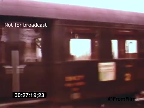 The 16mm still from 'Vincent Van Gogh: A Self-Portrait' (1961) depicts a moving train, emphasizing the theme of travel and transition. The image is likely part of a montage connecting Van Gogh's life with his artwork and experiences. The presence of Lee J. Cobb, potentially as a narrator, adds depth to the portrayal of the artist. The text overlay indicates that the footage is not for broadcast, suggesting it might be archival or behind-the-scenes material.