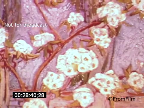 The still from 'Vincent Van Gogh: A Self-Portrait (1961)' features a close-up of blooming flowers, rendered in vibrant colors and textured brushstrokes. The composition captures Van Gogh's signature style, showcasing lively petals and a dynamic interplay of light and shadow against a backdrop that reflects his fascination with nature. This still emphasizes the emotional depth and visual intensity characteristic of Van Gogh's work.