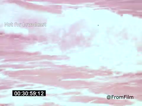 The still from 'Vincent Van Gogh: A Self-Portrait' (1961) likely features a vivid, expressive representation of waves, embodying the emotional intensity often associated with Van Gogh's style. The use of color hints at an artistic interpretation, blending abstraction with natural elements. The presence of Lee J. Cobb suggests a dramatic narration, complementing the visual impact of the scene. This specific moment captures a sense of turmoil reflective of both the ocean’s movement and Van Gogh’s turbulent life.