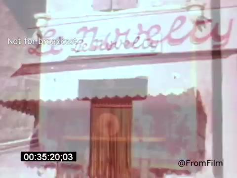 The still from 'Vincent Van Gogh: A Self-Portrait' (1961) features the exterior of a building with the name 'Le Ravelle' painted prominently. The image may convey a sense of the vibrant life surrounding Van Gogh, reflecting his connection to places that influenced his art. The film highlights the artist's life and struggles, narrated by Lee J. Cobb, emphasizing both the beauty and turmoil of Van Gogh's existence.