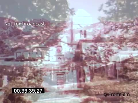 The 16mm still from 'Vincent Van Gogh: A Self-Portrait (1961)' likely captures a blending of natural elements and architecture, suggesting a scene reflective of Van Gogh's artistic landscape. The overlay of colors hints at an impressionistic style, echoing Van Gogh's own techniques. With Lee J. Cobb's narration, the scene embodies a contemplative atmosphere, inviting viewers to engage with the life and artistry of Van Gogh.