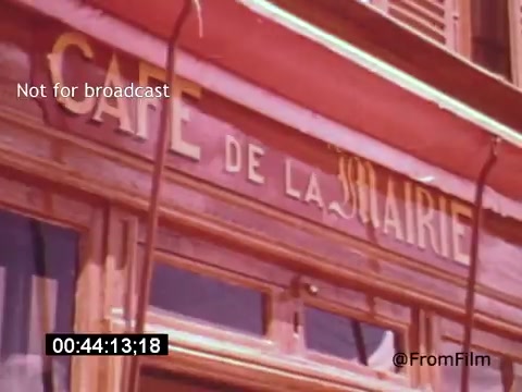The still from 'Vincent Van Gogh: A Self-Portrait' (1961) features the exterior of a café, specifically 'Café de la Galerie.' The image captures the building's sign, likely emphasizing the environment where Van Gogh frequented. The film combines elements of biography and artistry, with Lee J. Cobb's narration enhancing the connection to Van Gogh's life and work. For more support, consider visiting: https://ko-fi.com/fromfilm.