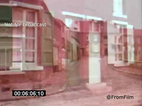 The still from 'Vincent Van Gogh: A Self-Portrait (1961)' features an overlay of a quaint street scene, capturing the essence of Van Gogh's environment. The colors are soft, with a dreamlike quality, hinting at the artist's emotional landscape. It evokes a sense of nostalgia and reflection, aligning with the introspective nature of the film, narrated by Lee J. Cobb. The scene suggests an exploration of Van Gogh's life and artistry through a unique visual perspective.