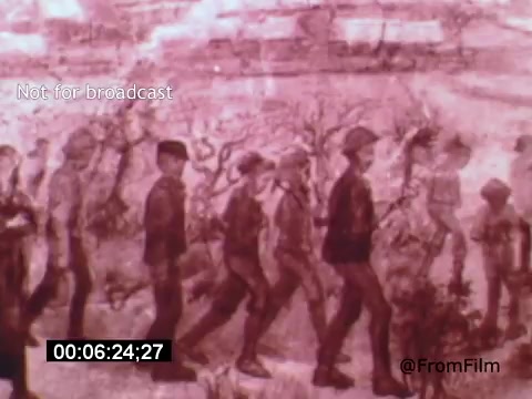 The still from 'Vincent Van Gogh: A Self-Portrait' (1961) depicts a serene, sepia-toned scene featuring a group of figures walking, possibly in a field or rural setting. The image emphasizes the expressive nature of Vincent Van Gogh's style, hinting at themes of movement and human experience, reflective of the artist's life and struggles. The presence of Lee J. Cobb adds a narrative depth, likely providing context to Van Gogh's artistic journey.