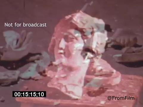 The still from 'Vincent Van Gogh: A Self-Portrait' (1961) features a close-up of a sculptural bust, likely representing a classical figure. The image has a slightly distorted quality, contributing to an artsy aesthetic. It appears to be set against a textured background, emphasizing the object's form and detail. The presence of artifacts around the bust hints at themes of art history, resonating with Van Gogh's artistry and emotional depth.