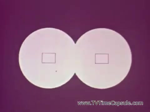 The still from the 'American Dental Association PSA - Oral Cancer' features two overlapping circles against a purple background. Each circle contains a small square in the center. This visual representation likely aims to convey a message about the importance of early detection in preventing oral cancer, highlighting the seriousness of the disease and the need for awareness and action. The use of simple geometric shapes emphasizes clarity and focus on the critical issue of oral health.