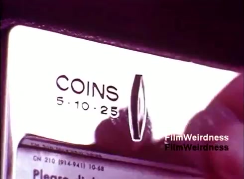 The still from 'Bell Performance' features a close-up of a vintage payphone's coin slot, prominently displaying the denominations of 5, 10, and 25 cents. The shiny metal surface suggests age and wear, indicative of its use over time. The film captures a nostalgic moment, highlighting the history of telecommunications and the role of payphones in that era. The simplicity of the design reflects the utilitarian style of the 1970s.