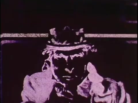The still from the 16mm promo film for the Sikorsky S-76 features a stylized and graphic representation of a figure, likely inspired by pop art aesthetics. The image is characterized by bold colors and striking contrasts, capturing a dramatic expression. This artistic style aligns with the film's introductory theme of showcasing iconic figures, leading up to the eventual introduction of the Sikorsky brand. The lack of narration leaves the context open to interpretation, emphasizing the visual elements in this silent workprint.