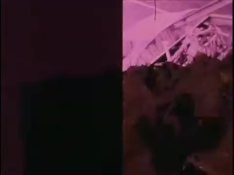 The still from the 16mm promo film for the Sikorsky S-76 features a visually striking image characterized by a blend of bold colors, primarily pink and black. It captures an abstract composition, possibly depicting parts of the helicopter or elements related to aviation, with a focus on textures and shapes. The montage likely aims to evoke a sense of innovation and modernity, aligning with the promotional intent of showcasing the Sikorsky S-76. The lack of narration leaves the interpretation open to viewer imagination.