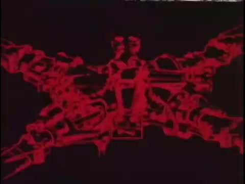 The still from the 1977 Sikorsky S-76 promo film features a striking, stylized graphic representation of the helicopter's machinery. It employs a bold red color against a black background, giving it a dramatic and high-tech aesthetic. The design likely highlights key components of the Sikorsky S-76, emphasizing its engineering sophistication. This silent workprint, devoid of narration, invites viewers to interpret the imagery without auditory context, focusing entirely on the visual elements.
