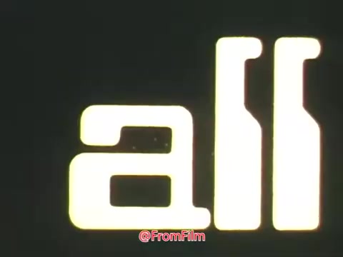 The still from the 'Point Park College PSA - 1969' features stylized typography, prominently displaying the word 'all.' The design is likely vivid and graphics-driven, characteristic of promotional materials from that era. The context suggests an emphasis on technology and progress, referencing punched cards and hard copy terminals, highlighting the advancements in education and computing at Point Park College in the late 1960s.