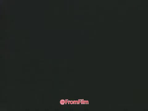 The still from 'Point Park College PSA - 1969' features punched cards and a hard copy terminal, reflecting the state of technology in education during that period. It symbolizes early computer processing methods used in academic environments. This captures a moment in the history of Point Park College, highlighting its evolution into Point Park University and the advancements in educational tools over the years.