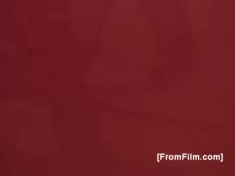 The still from the 'Men on the Moon' PSA highlights a simplistic yet poignant visual style typical of 1970s public service announcements. The red background conveys a sense of urgency and attention, while the imagery, likely featuring themes of aspiration and support, reflects the campaign's focus on raising awareness for muscular dystrophy. The overall aesthetic is emblematic of the era's approach to social advocacy, blending emotional appeal with a call to action.